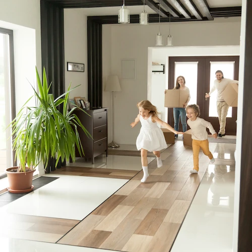 Kids and Family Running Through The Home